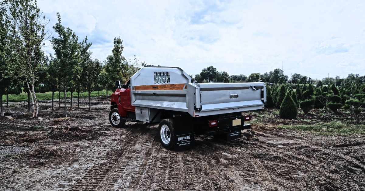 Truck with silver Knapheide dump body